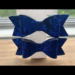 Pair of blue hair bows